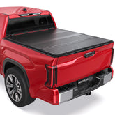 Toyota Tacoma Red pickup truck equipped with a MOSTPLUS FRP hard quad-fold tonneau cover fully closed over the bed