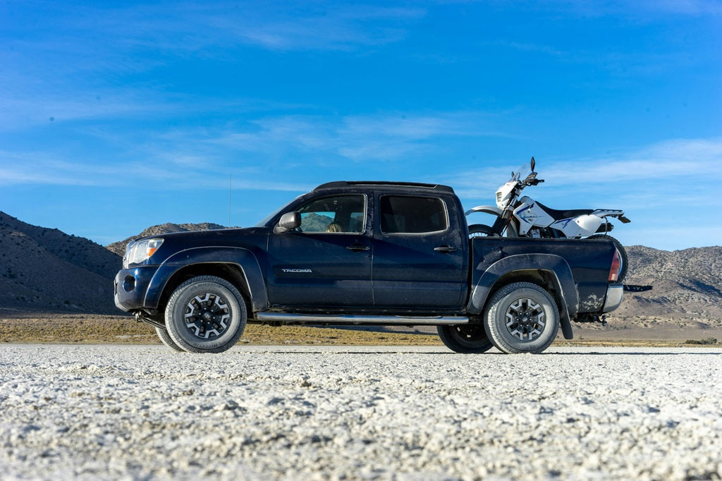 Is it safe to drive with a tonneau cover open?