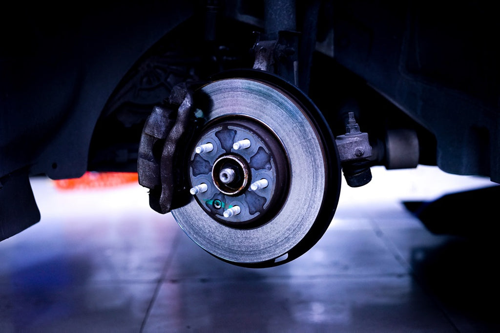 How do you check brake pad wear?