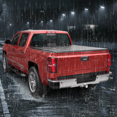 83-11 Ford Ranger red pickup truck with a MOSTPLUS FRP hard quad-fold tonneau cover driving in heavy rain at night